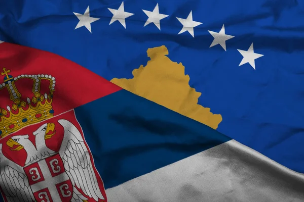 Silk Flags of Serbia and Kosovo. Political crisis .Concept of bad relations between Serbian and Kosovo.