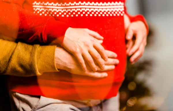 Husband Hugs His Wife Pregnant Belly Christmas Atmosphere Close Hands — Stock Photo, Image