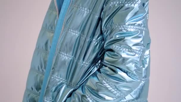 Nice coat in blue metallic color with pockets and white zipper — Video