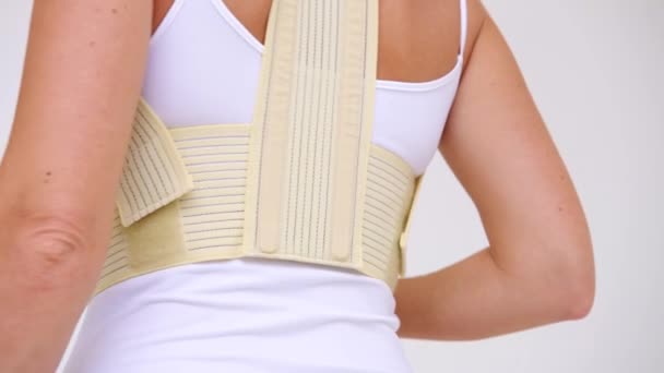 Orthopedic Lumbar Support Products Lumbar Support Belts Posture Corrector Back — Stock Video