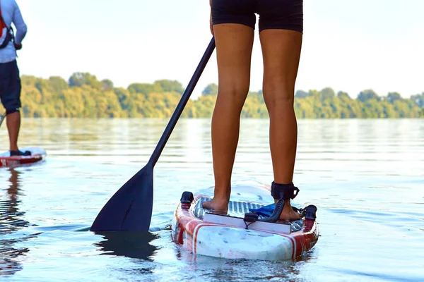 Close Woman Legs Stand Paddle Water — 图库照片
