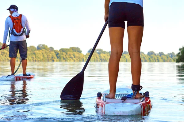 Close Woman Man Legs Stand Paddle Water — 图库照片