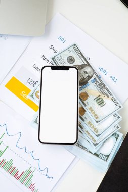 Borsa kağıt geçmişi ve para üzerinde telefon modeli