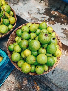 fresh green and yellow guava in the market