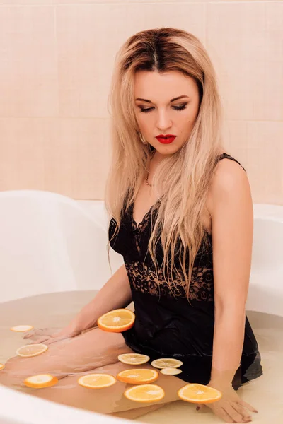 Blonde Girl Black Bodysuit Takes Bath Fruits Shes Sitting Bathroom — Photo