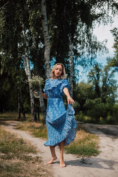 Woman Long Blue Dress Whirls Has Fun — Photo