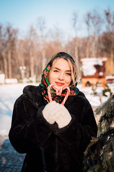 Girl Stands Snowy Sunny Frosty Day Hands Girl Lollipops She — Stock Photo, Image