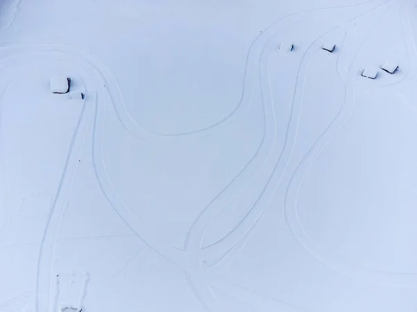 Vista Aérea Terra Coberta Neve Com Casas Telhados — Fotografia de Stock