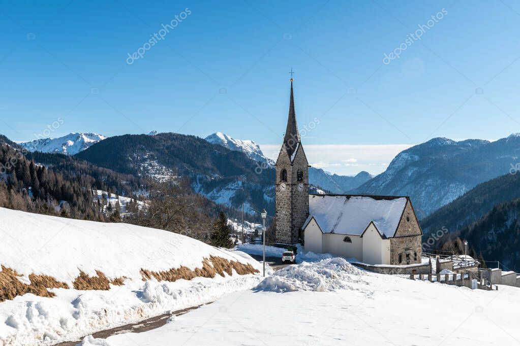 San Lorenzo church in Sauris di Sopra. Beautiful winter landscape