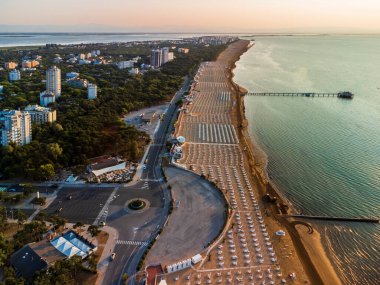 Aerial view of the coastline and the beach of Lignano Sabbiadoro, Italy.