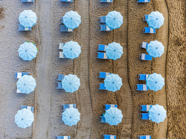 View from the top of the sunbeds and umbrellas on the beach of Lignano Sabbiadoro.