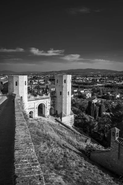 Medieval architecture of village in Umbria, magic of Spello in black and white.