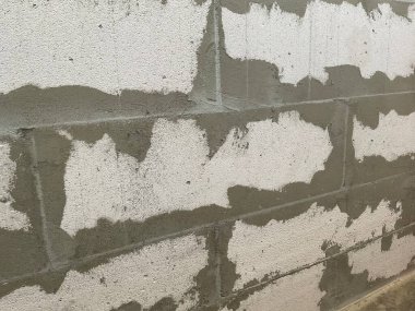 The wall is made of gas block Abstract wallpaper for design Background of brick wall 