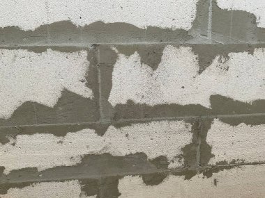 The wall is made of gas block Abstract wallpaper for design Background of brick wall 