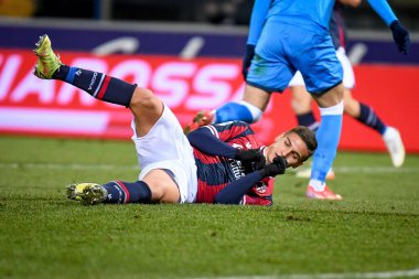 İtalyan futbolcu Nicolas Dominguez 17 Ocak 2022 tarihinde İtalya 'nın Bologna kentindeki Renato Dall & # 39; Ara stadyumunda oynanan Serie A karşılaşmasında tepki gösterdi - Fotoğraf: Ettore Griffon
