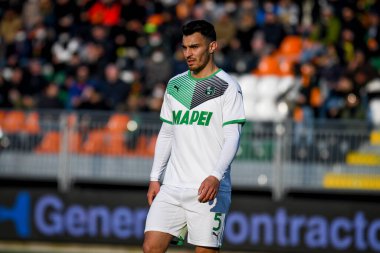 Sassuolo 'nun Kaan Ayhan portresi İtalyan futbolu Serie A maçı sırasında Venezia FC ile ABD Sassuolo arasında Venedik, İtalya' daki Pier Luigi Penzo Stadyumu 'nda oynandı.