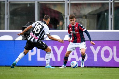 Bologna's Aaron Hickey in action against Udinese's Nahuel Molina  during  italian soccer Serie A match Bologna FC vs Udinese Calcio at the Renato Dall'Ara stadium in Bologna, Italy, April 24, 2022 - Credit: Ettore Griffon