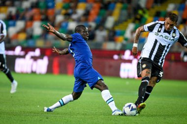 Chelsea's N'Golo Kante in action against  Udinese's Roberto Maximiliano Pereyra  during  friendly football match Udinese Calcio vs Chelsea FC at the Friuli - Dacia Arena stadium in Udine, Italy, July 29, 2022 - Credit: Ettore Griffon