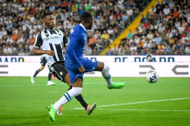 Chelsea's N'Golo Kante in action against Udinese's Destiny Iyenoma Udogie  during  friendly football match Udinese Calcio vs Chelsea FC at the Friuli - Dacia Arena stadium in Udine, Italy, July 29, 2022 - Credit: Ettore Griffon