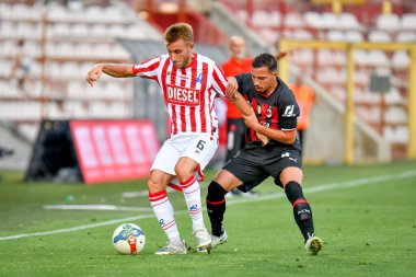 Vicenza's Loris Zonta in action against Milan's Ismael Bennacer  during  friendly football match LR Vicenza vs AC Milan at the Romeo Menti stadium in Vicenza, Italy, August 06, 2022 - Credit: Ettore Griffon