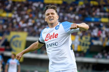 Napoli's Piotr Zielinski celebrates after scoring a goal  during  italian soccer Serie A match Hellas Verona FC vs SSC Napoli at the Marcantonio Bentegodi stadium in Verona, Italy, August 15, 2022 - Credit: Ettore Griffon