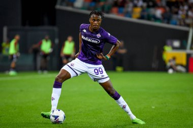 Fiorentina's Christian Kouame portrait in action  during  italian soccer Serie A match Udinese Calcio vs ACF Fiorentina at the Friuli - Dacia Arena stadium in Udine, Italy, August 31, 2022 - Credit: Ettore Griffon