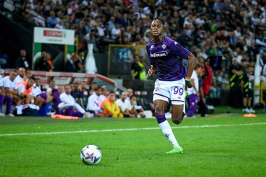 Fiorentina's Christian Kouame portrait in action  during  italian soccer Serie A match Udinese Calcio vs ACF Fiorentina at the Friuli - Dacia Arena stadium in Udine, Italy, August 31, 2022 - Credit: Ettore Griffon