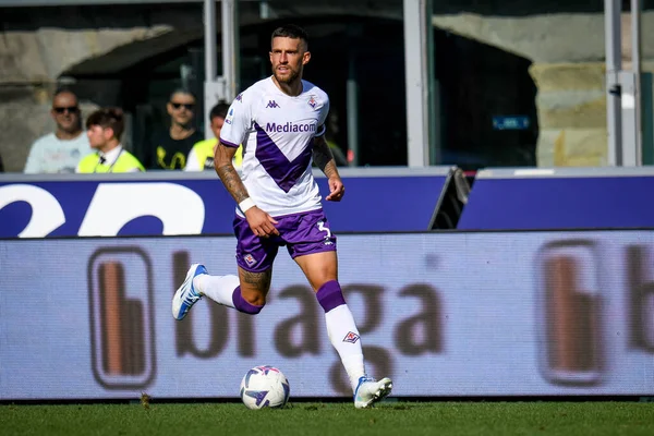 Dusan Vlahovic of Juventus and Christiano Biraghi of Acf Fiorentina during  the Italian serie A, football match between Juventus Fc and Acf Fiorentina  on 12 February 2023 at Allianz Stadium, Turin, Italy.