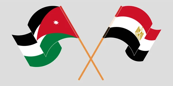 Banderas cruzadas y ondeando de Jordania y Egipto — Vector de stock