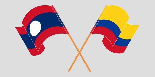 跨越并挥动老挝和哥伦比亚的国旗 — 图库矢量图片