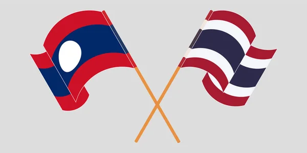 Drapeaux croisés et agitant du Laos et de la Thaïlande — Image vectorielle