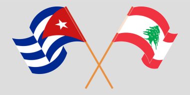 Crossed and waving flags of Lebanon and Cuba
