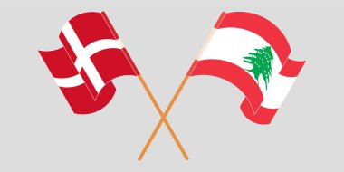 Crossed and waving flags of Lebanon and Denmark