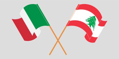 Crossed and waving flags of Lebanon and Italy
