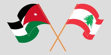 Crossed and waving flags of Lebanon and Jordan