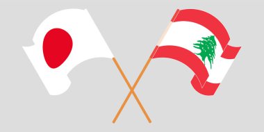 Crossed and waving flags of Lebanon and Japan