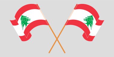 Crossed and waving flags of Lebanon