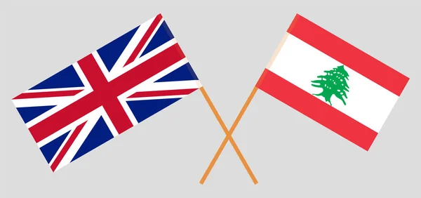 Crossed flags of Lebanon and the UK — Stock vektor