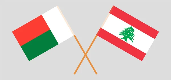 Crossed flags of Lebanon and Madagascar — Stock Vector