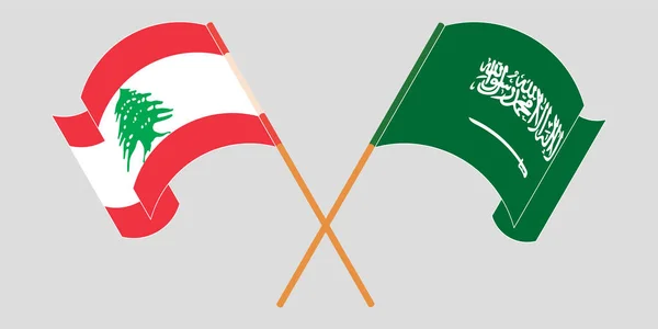 Crossed and waving flags of Lebanon and the Kingdom of Saudi Arabia — Stock Vector