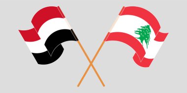 Lübnan ve Yemen 'in bayraklarını çaprazlayıp sallayarak.