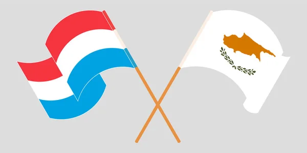 Przekroczone i machające flagi Luksemburga i Cypru — Wektor stockowy