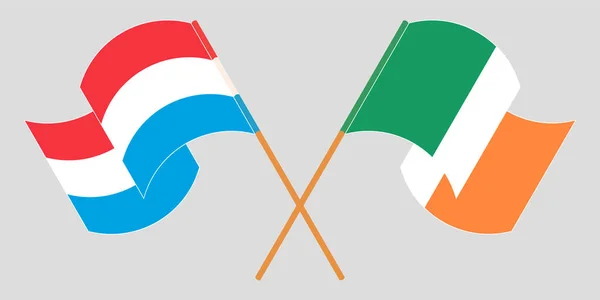 ルクセンブルクとアイルランドの旗を交互に振って — ストックベクタ