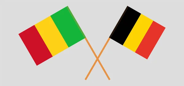 Korsade flaggor i Mali och Belgien — Stock vektor