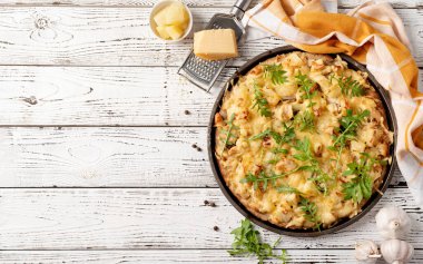 fresh homemade hawaiian pizza on white rustic table background