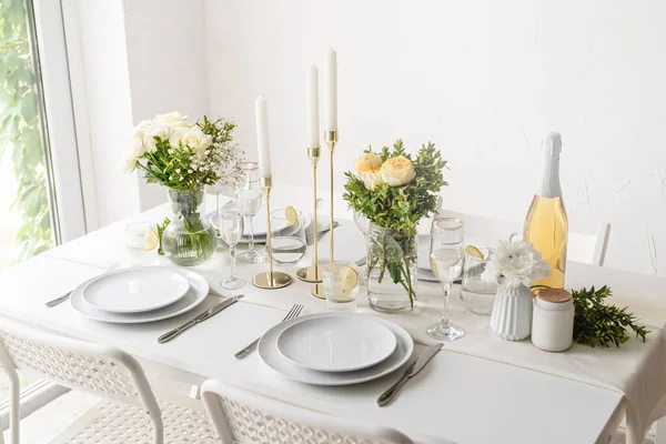 Wedding table set up in taditional style with roses grass and greenery. Wedding table scapes