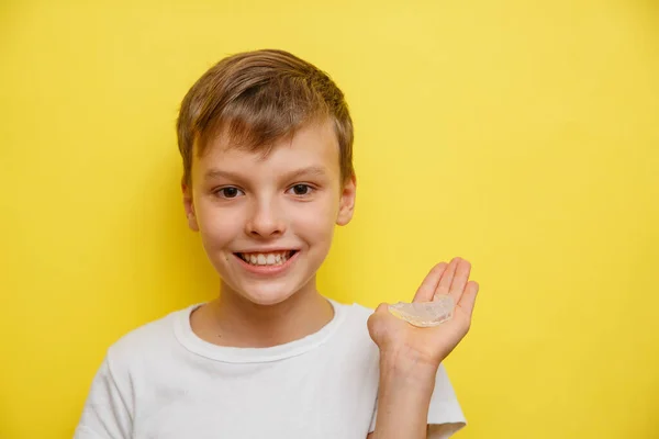 Close-up portret of the boy of orthodontic silicone trainer. — Stock Photo, Image