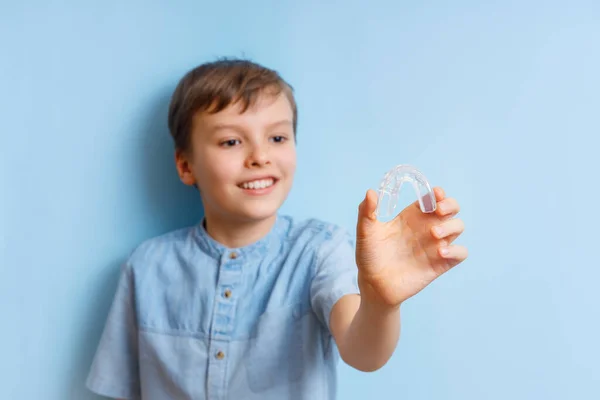 Portrait of the boy of orthodontic silicone trainer. — Stock Photo, Image