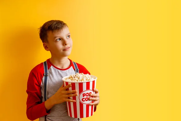 Banner with happy boy smiling with popcorn buckets — Stock Photo, Image