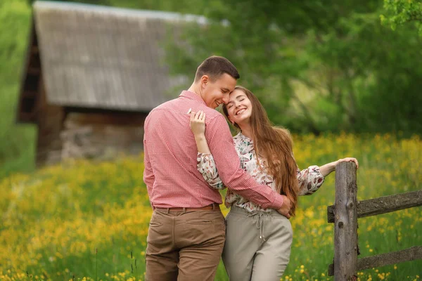 Young Loving Couple Gently Hugging Wood House Background Lot Yellow — ストック写真